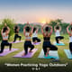 Women Practicing Yoga Outdoors - Cinematic Stock Video for Fitness and Wellness Creators 1