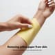 Removing Yellow Paper from Skin - Clean, Natural Lifestyle Stock Video for Family and Children Projects 3