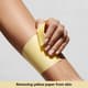 Removing Yellow Paper from Skin - Clean, Natural Lifestyle Stock Video for Family and Children Projects 6