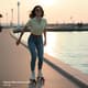Woman Roller Skating Near Water - Dynamic Stock Video for Sports and Fitness Content Creators 4