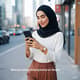 Woman Using Smartphone on Street - Dynamic Lifestyle Stock Video for Family & Social Content Creators 2025 5