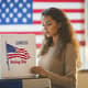 FestiFrame Studio US Woman Voting on Election Day - Authentic Stock Video for Civic & Social Campaigns 1
