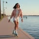 Woman Roller Skating Near Water - Dynamic Stock Video for Sports and Fitness Content Creators 6